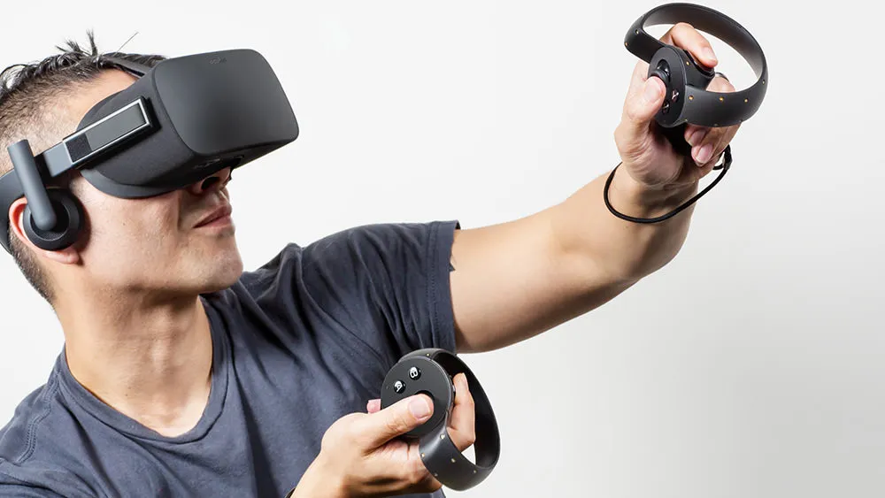 Oculus Touch controllers communicate directly with the headsets, no USB dongles required