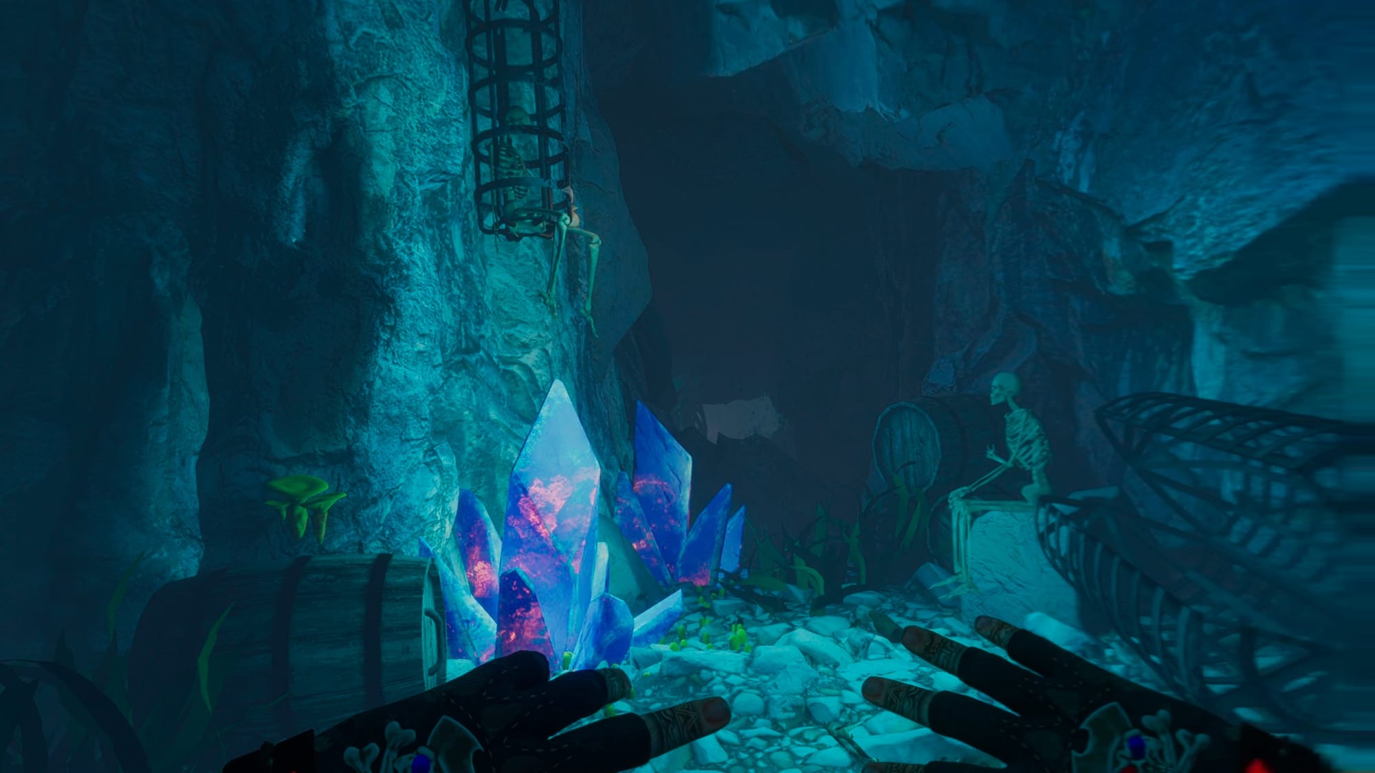 Someone swimming through an underwater cavern with blue and red crystals near