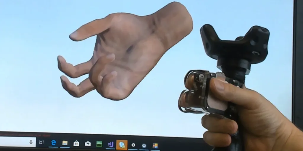 Microsoft Shows Off Haptic VR Controller, Simulates Grabbing With Thumb & Two Fingers