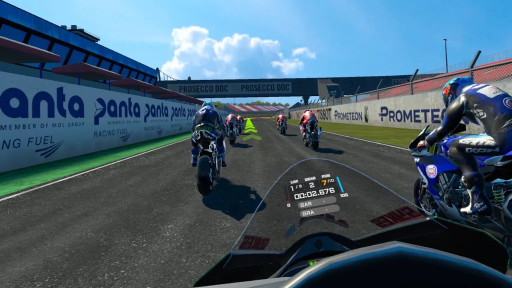 VRIDER review - A virtual racing scene of several racers on motorbikes.